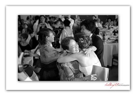 Mother of the Groom hugs the bride - Camp Arroyo Wedding