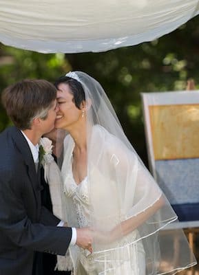 Brides kiss under Chuppah - UC Berkeley Faculty Club - Wedding