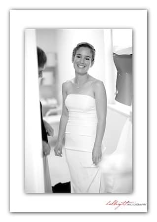 Bride in white standing in front of mirror - Camp Arroyo Wedding - Livermore Wedding